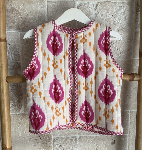 Chaleco reversible fuscia