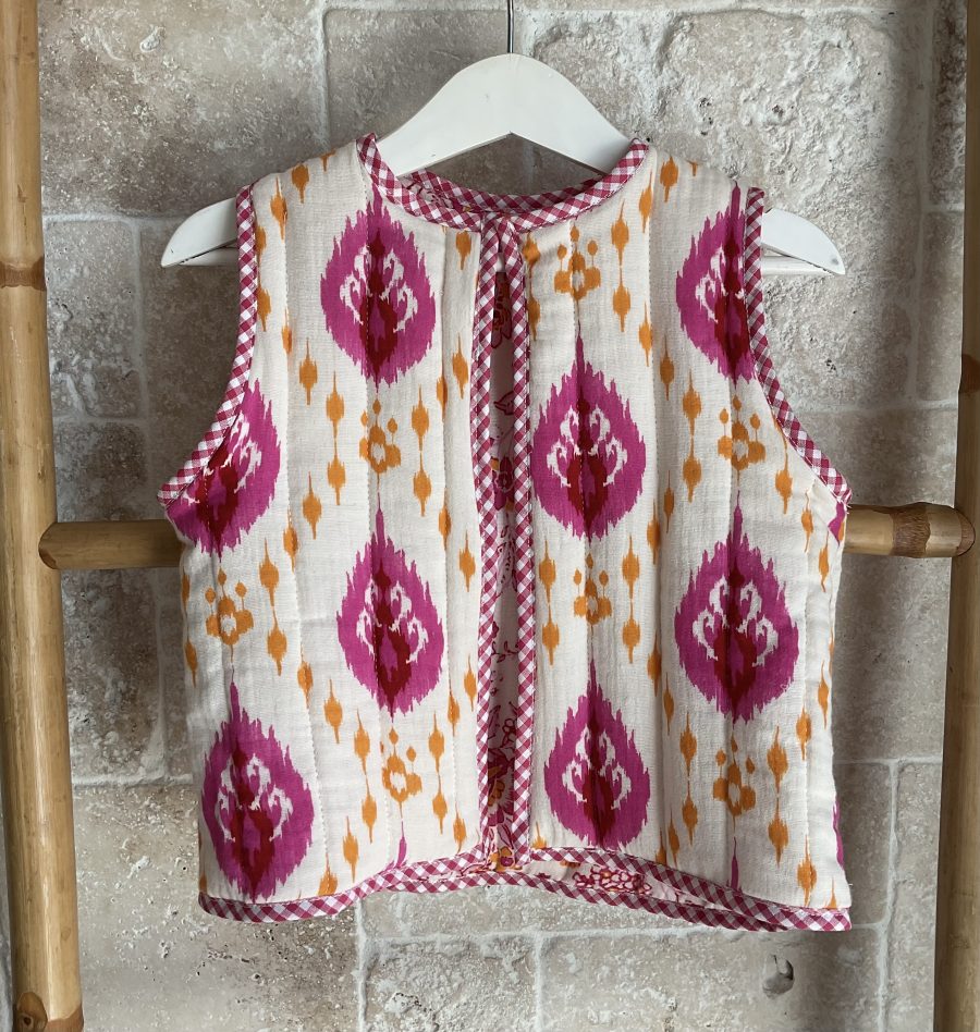 Chaleco reversible fuscia